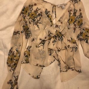 cute top with tie in front and open back